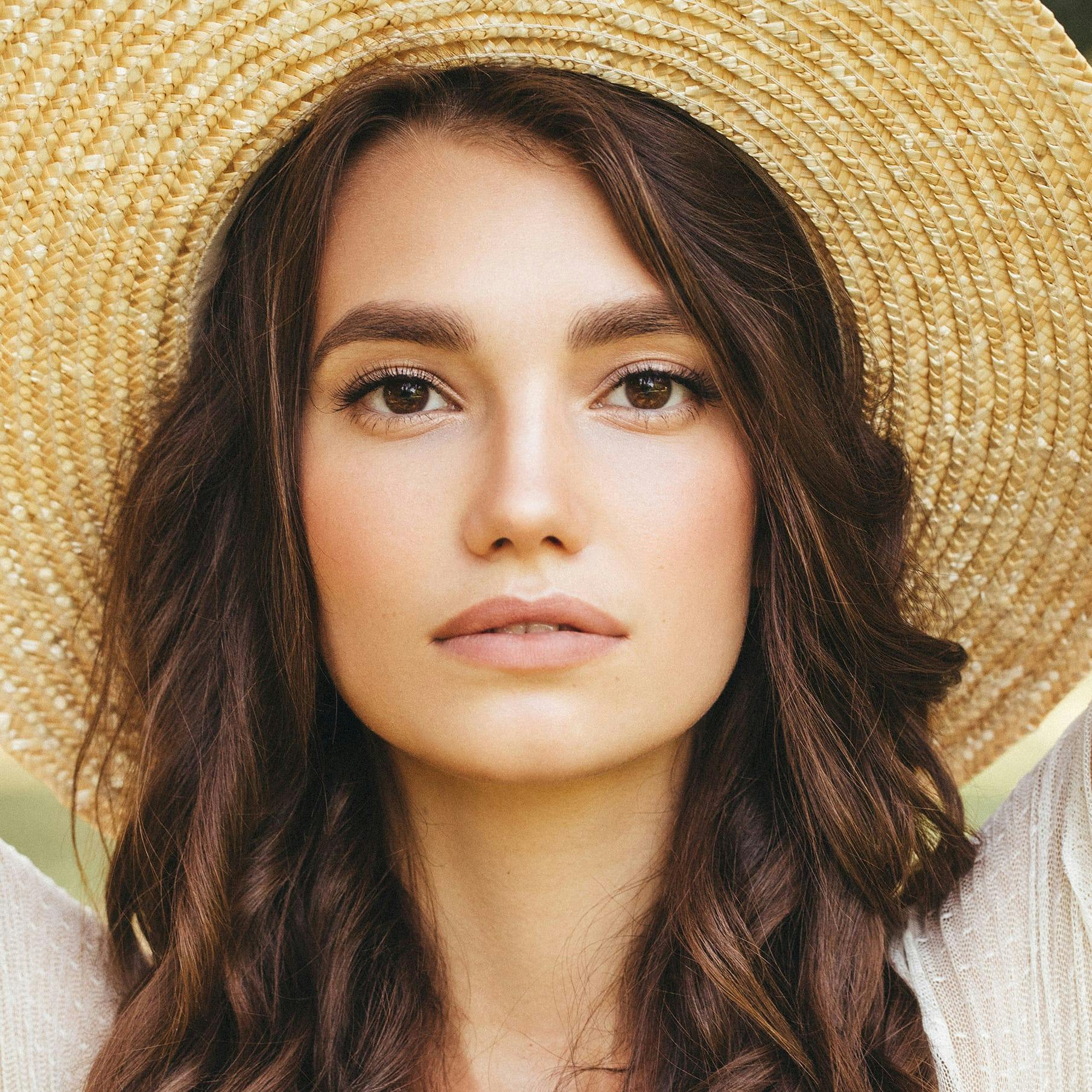 Woman Wearing Straw Hat