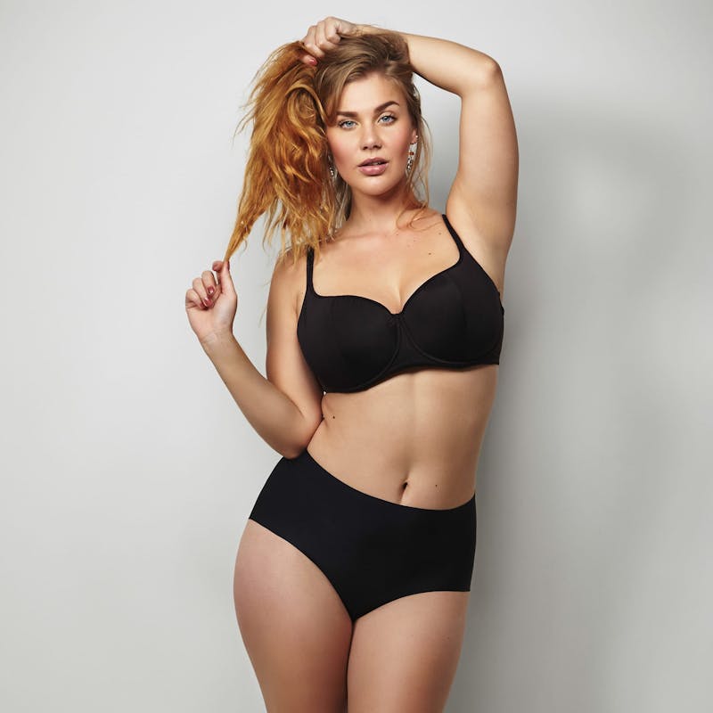 Woman Posing in Black Bra and Underwear