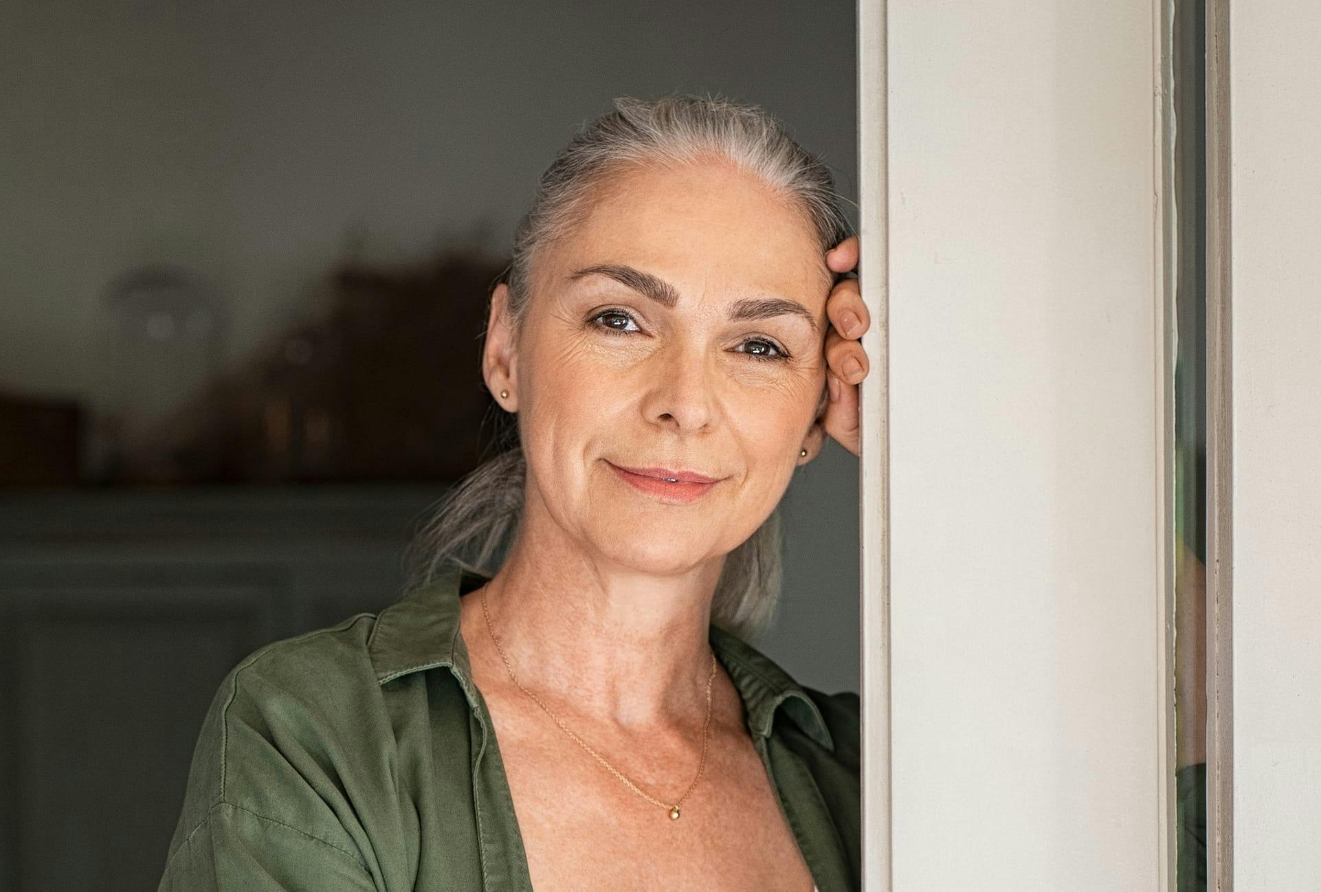 Woman Leaning on the Door Frame