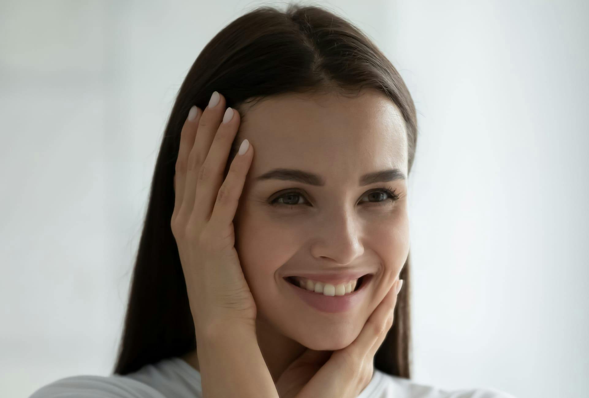 Woman with Her Hands on Her Face