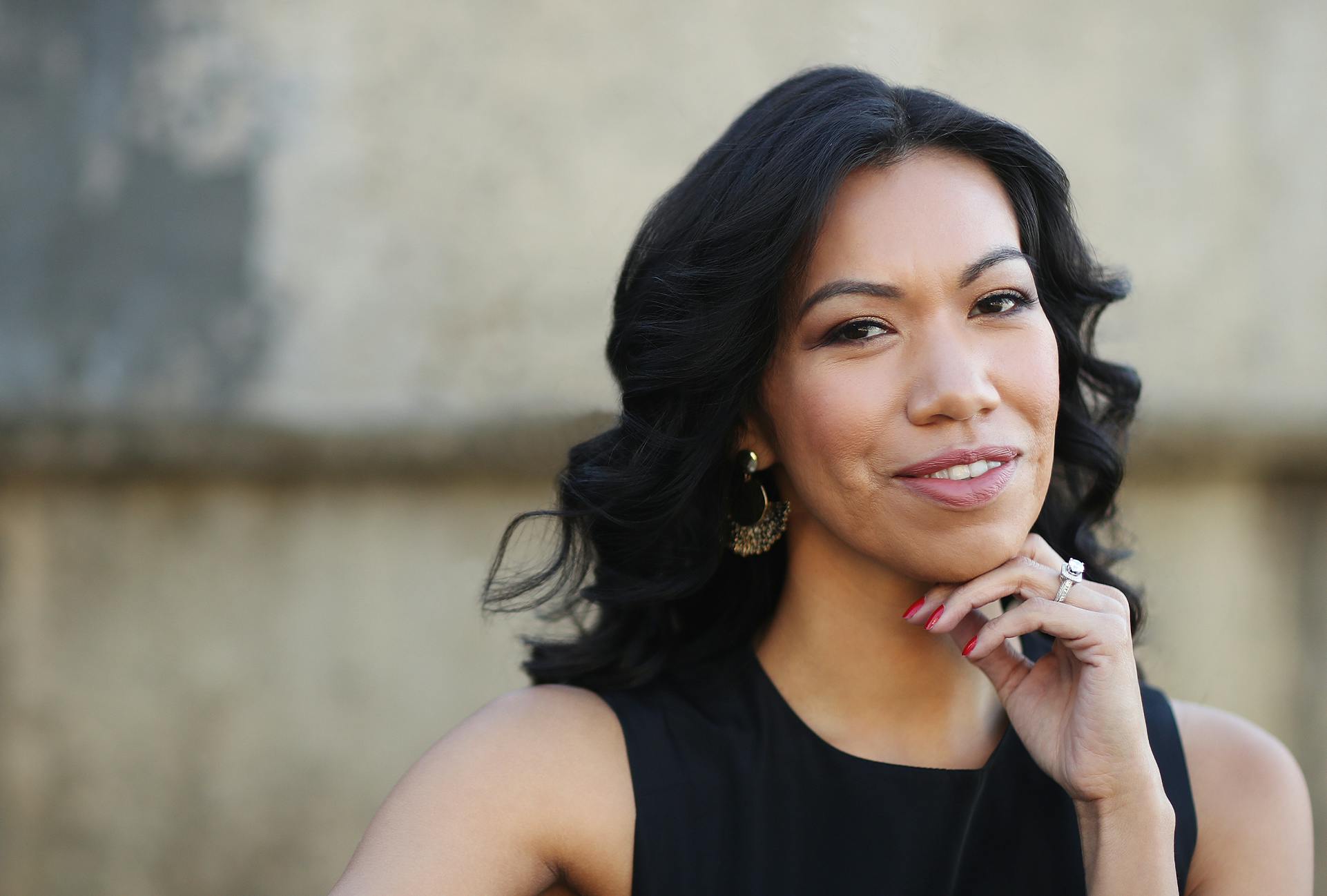 Woman Posing with her Hand on her Chin