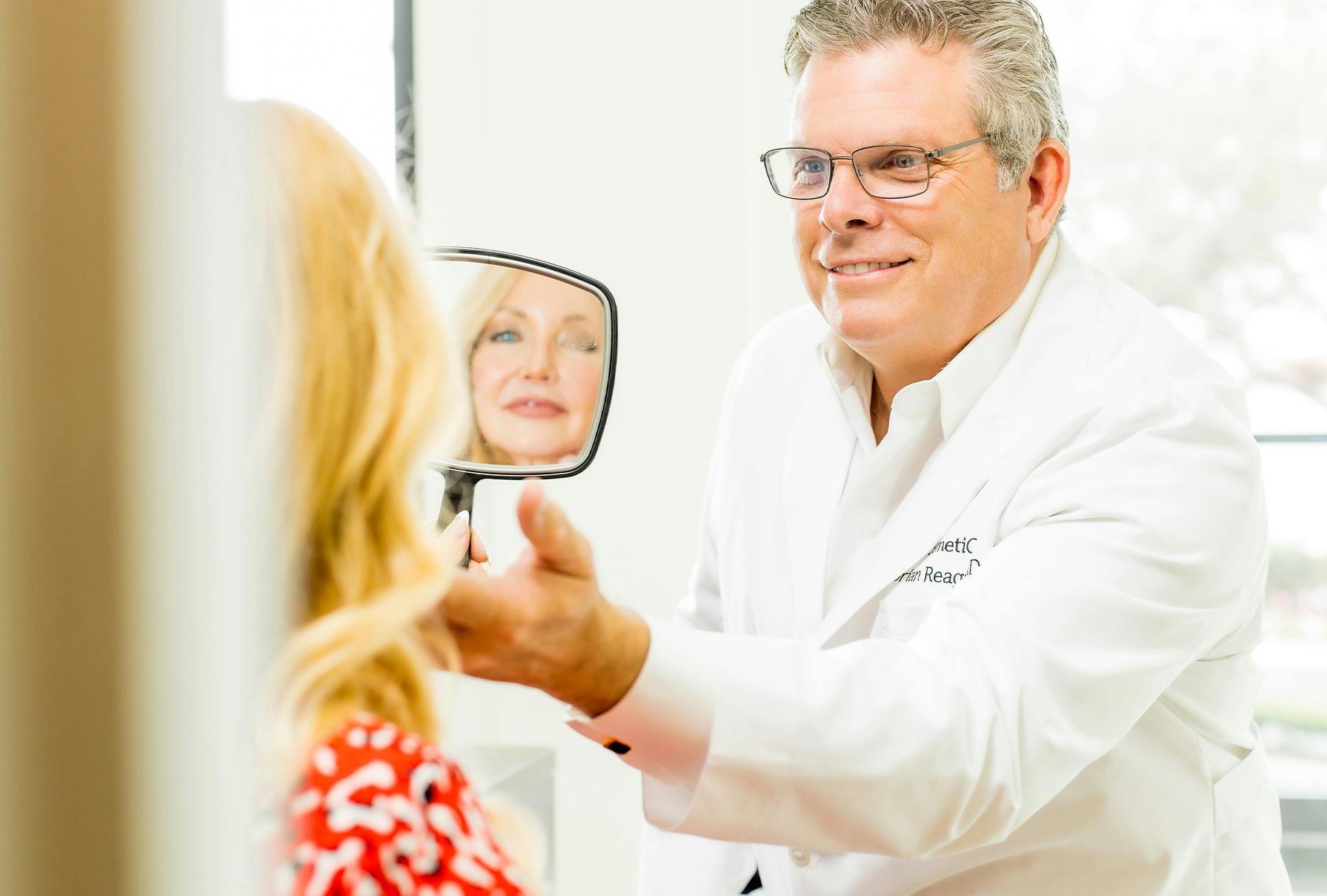 Doctor Showing Patient their Results in the Mirror