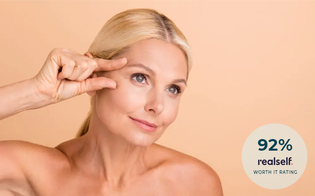 Woman with Blonde Hair and Bare Shoulders Posing