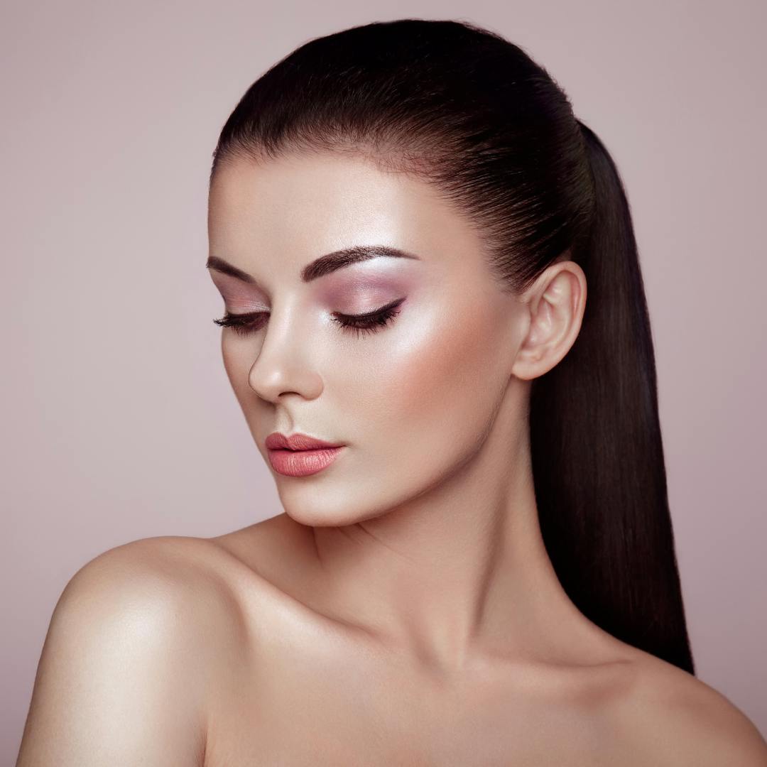 Woman Looking Down over her Shoulder