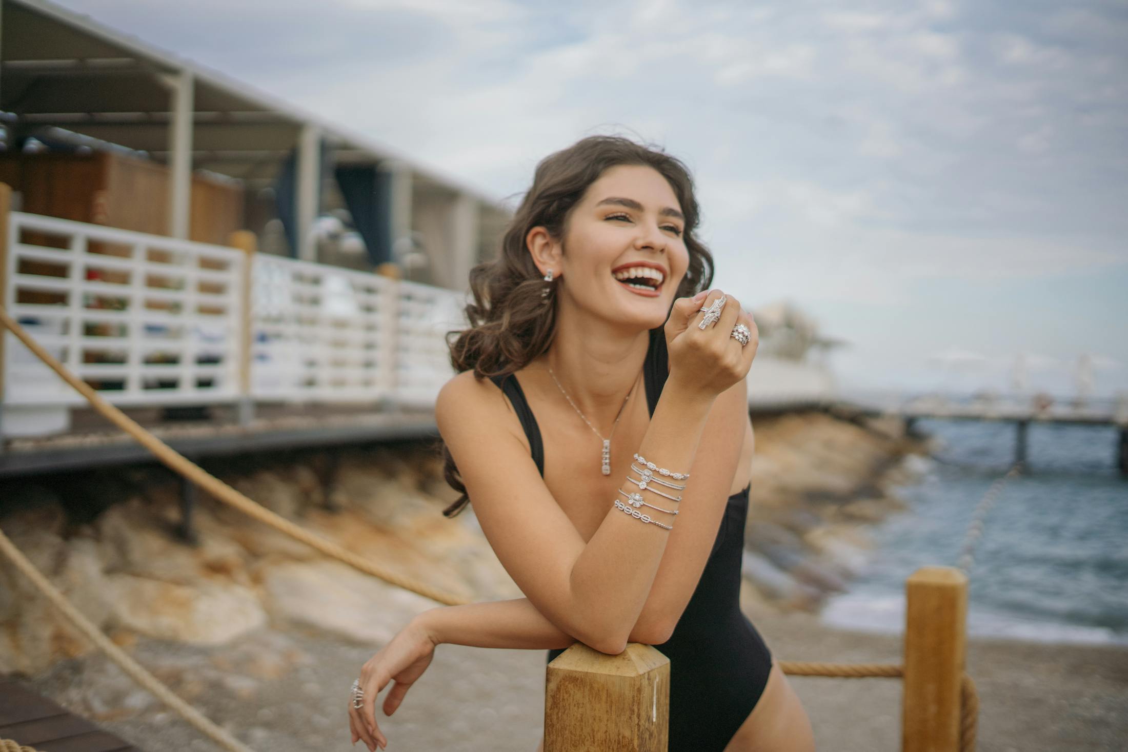 Woman in a bathing suit laughing