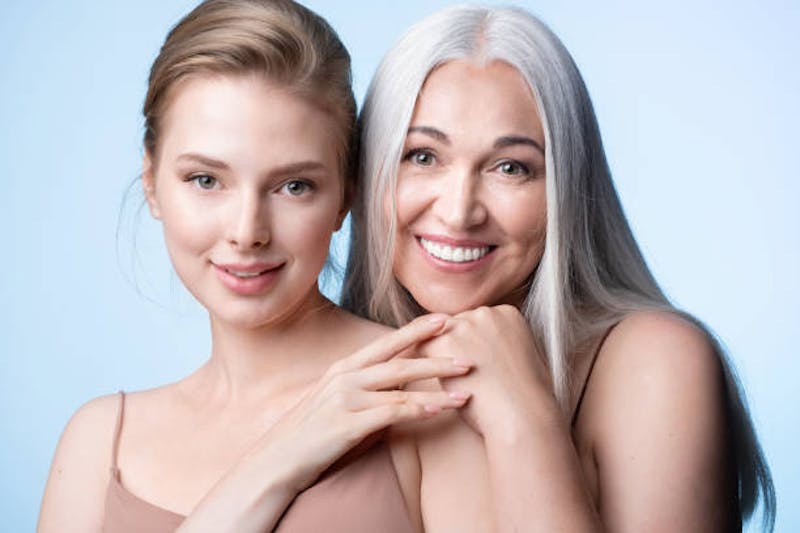 Mother and Daughter Posing Together