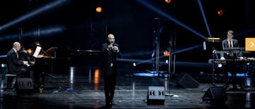 Artist singing on stage