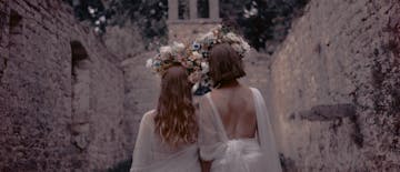 Two brides in an abandoned church