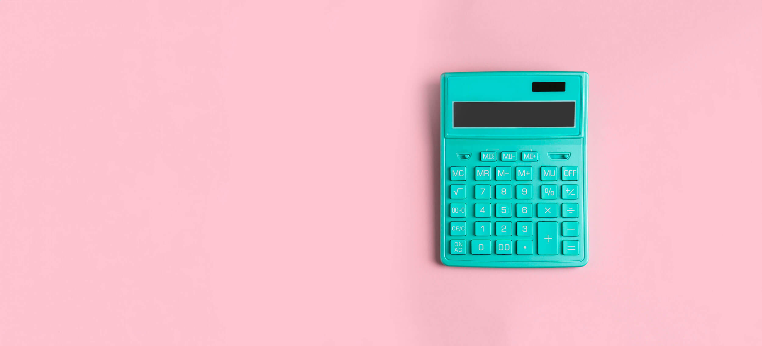 turquise calculator on pink background