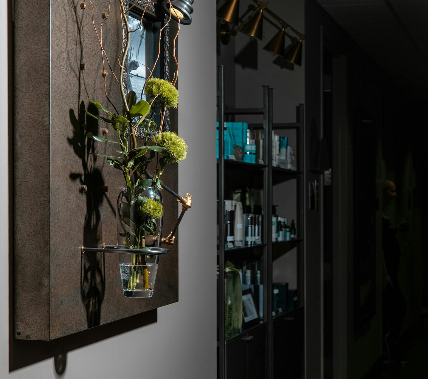 Flower vase on a wall in CVLC lobby