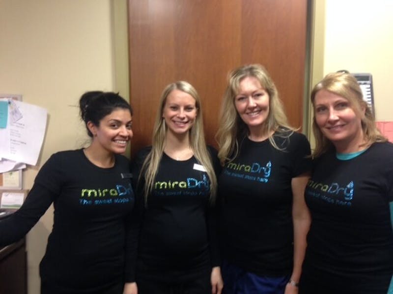 group of women wearing miradry shirts