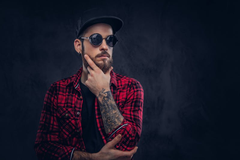 man in a red and black plaid shirt