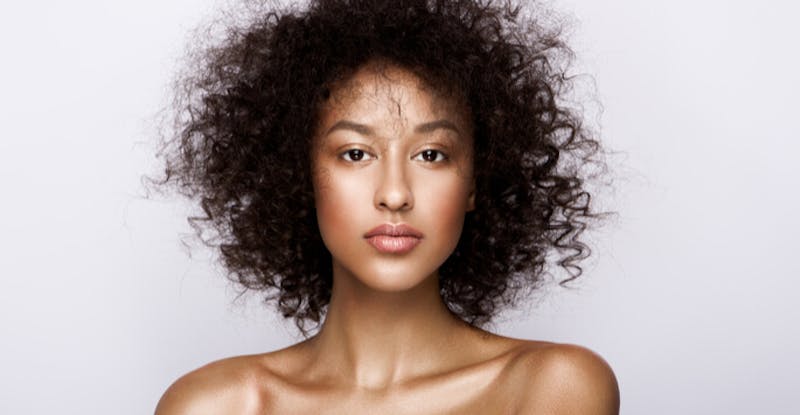 woman with very curly hair