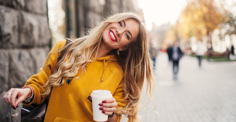 woman in a yellow sweater