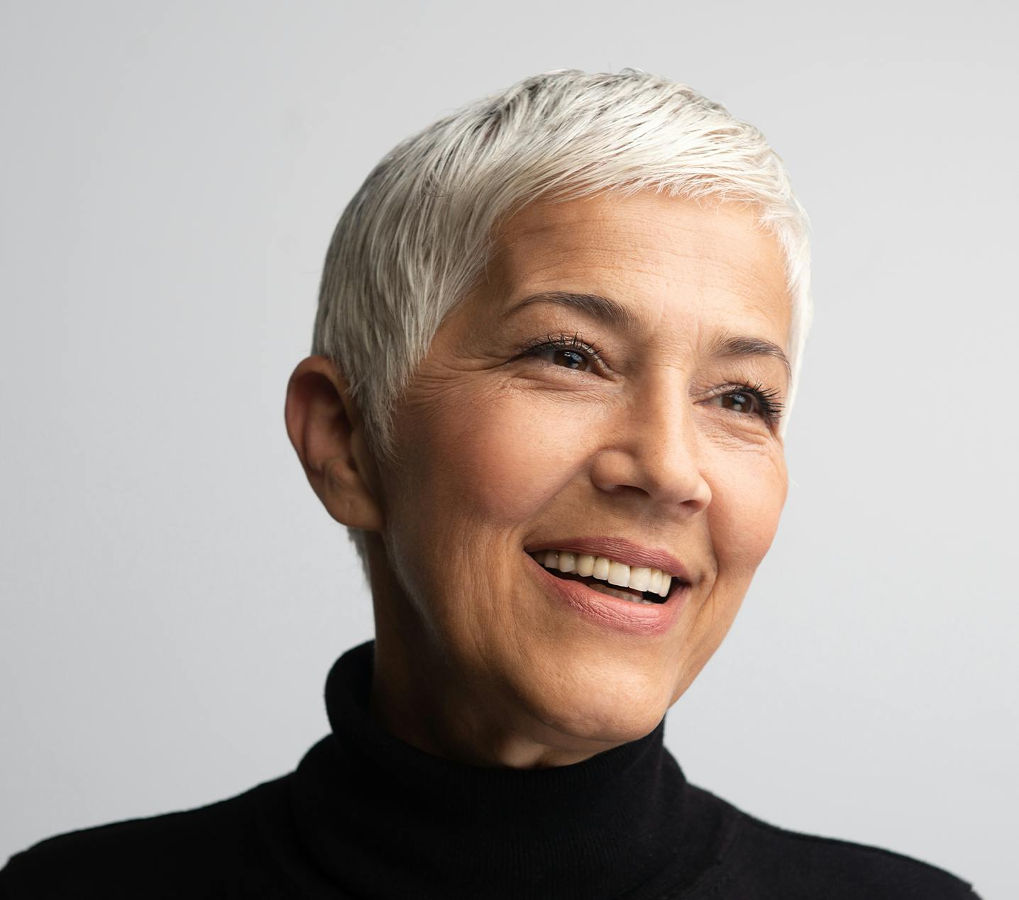 Beautiful older woman with very short grey hair