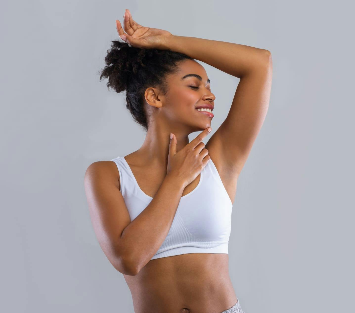 woman with her arm raised
