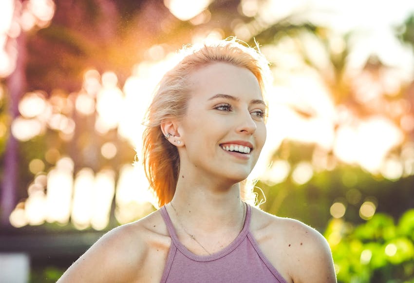 Woman smiling outside
