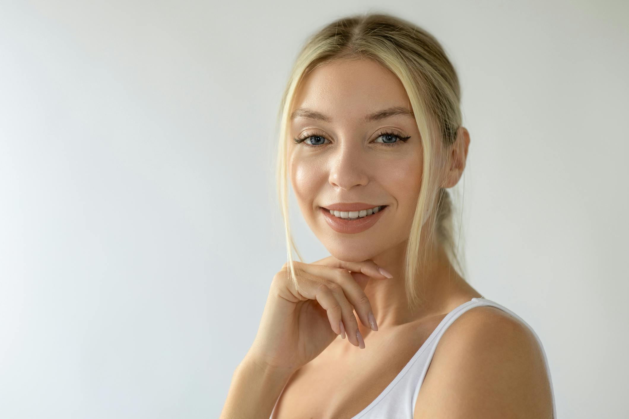 Woman touching her face