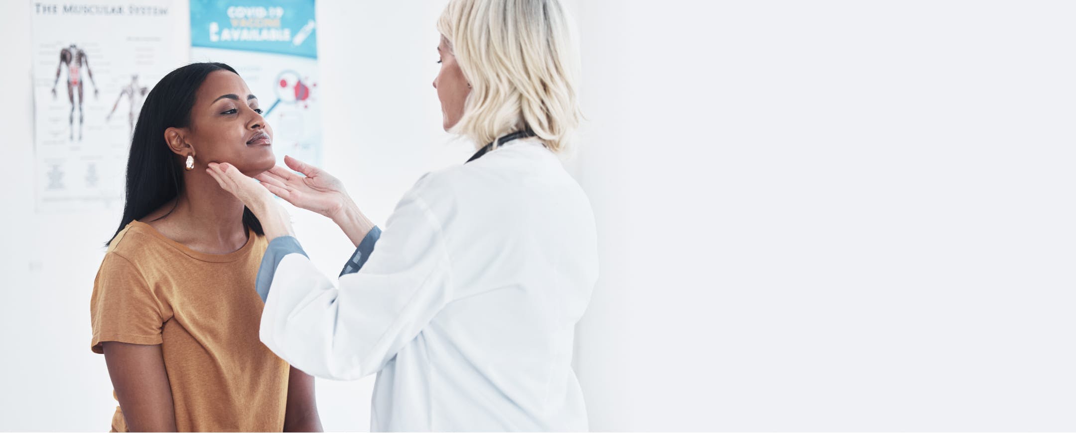 Female ENT physician evaluating patient