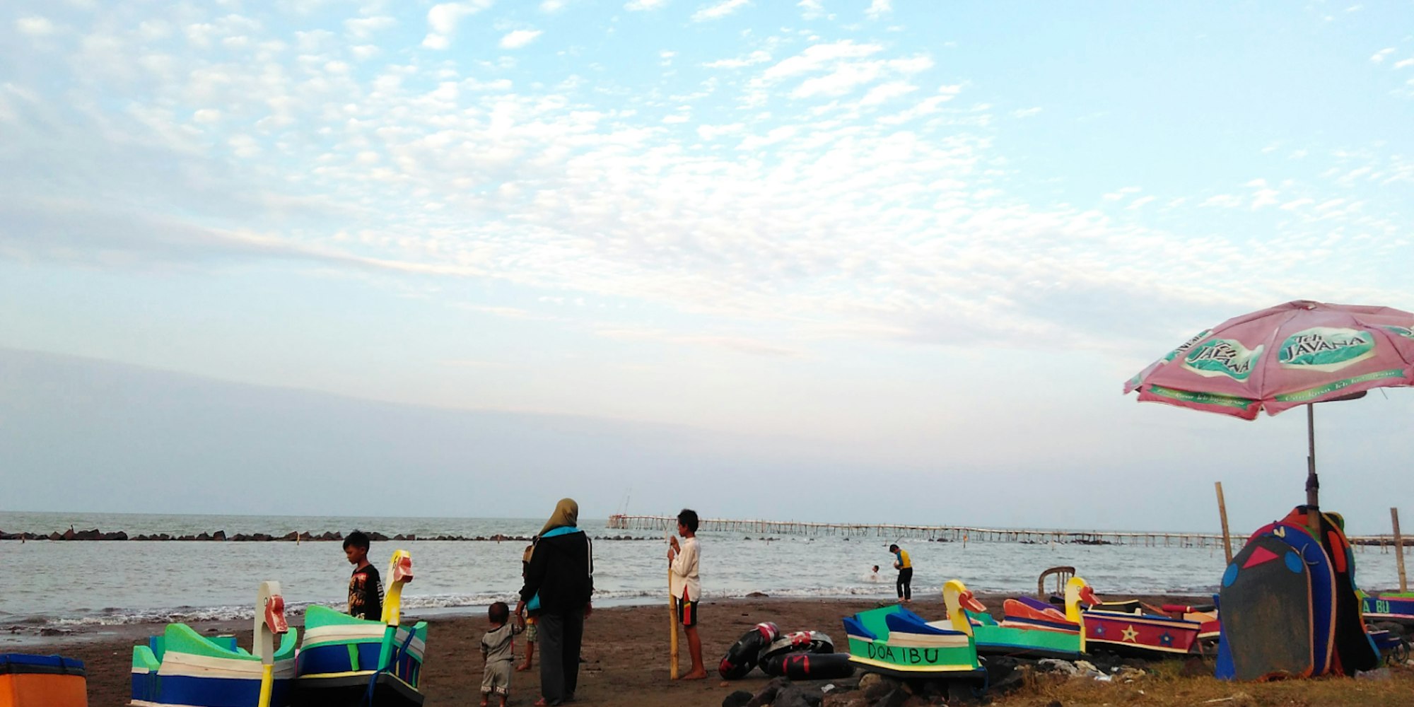 Cover Image for Brown Sandy Beach Along the Coastline of Java Island, Tirtamaya Beach Indramayu