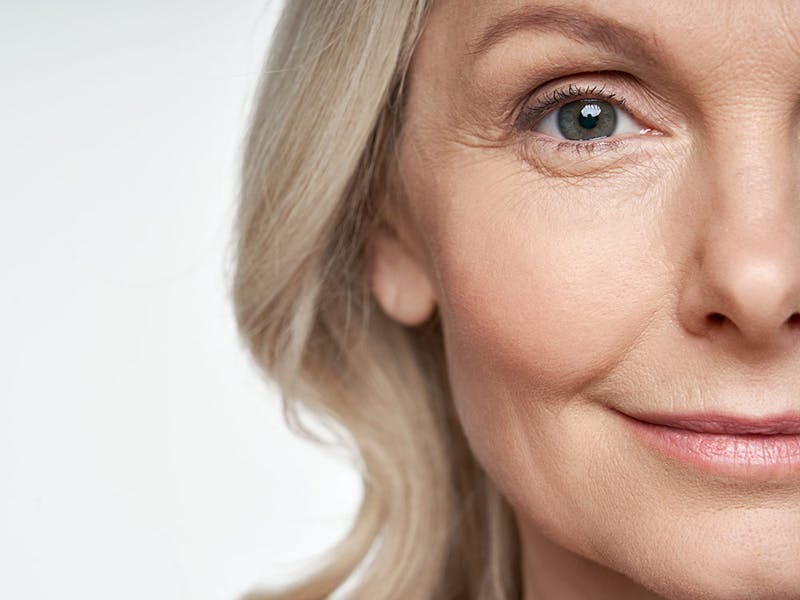 A close-up of woman in her 50s