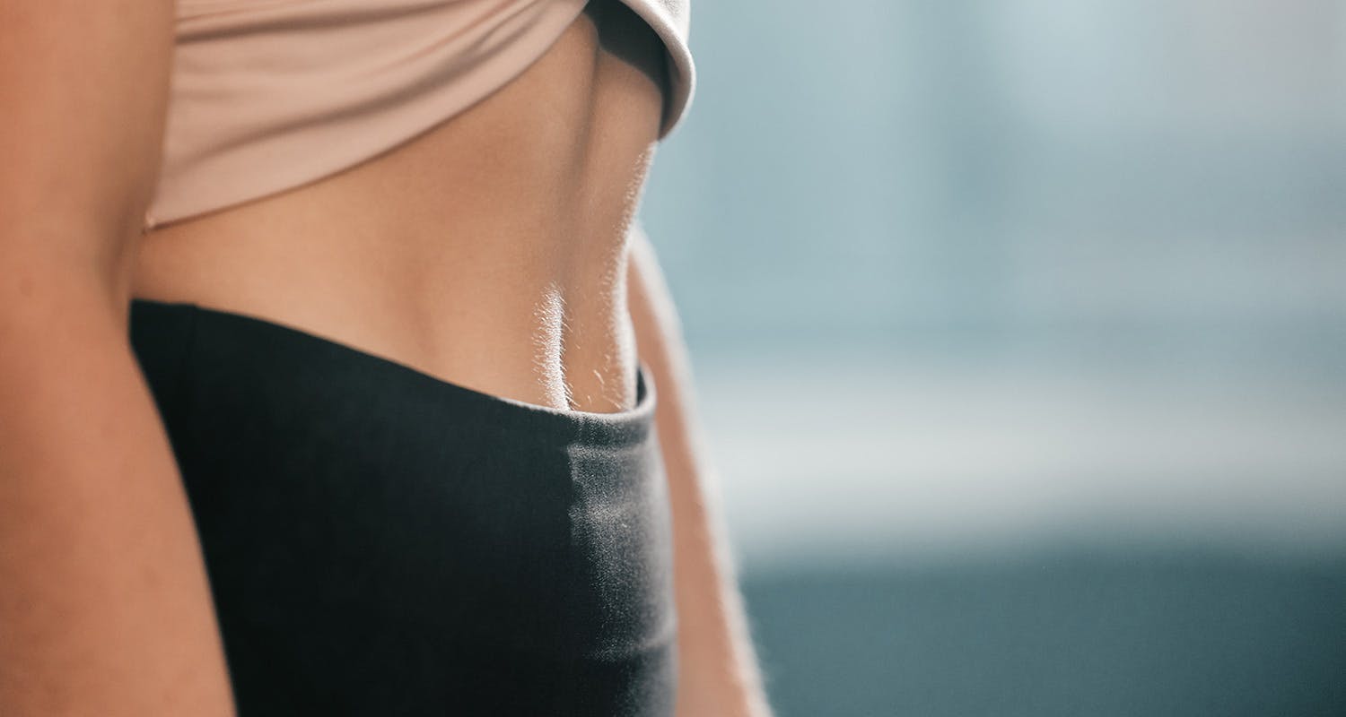 A beautiful woman with flat tummy