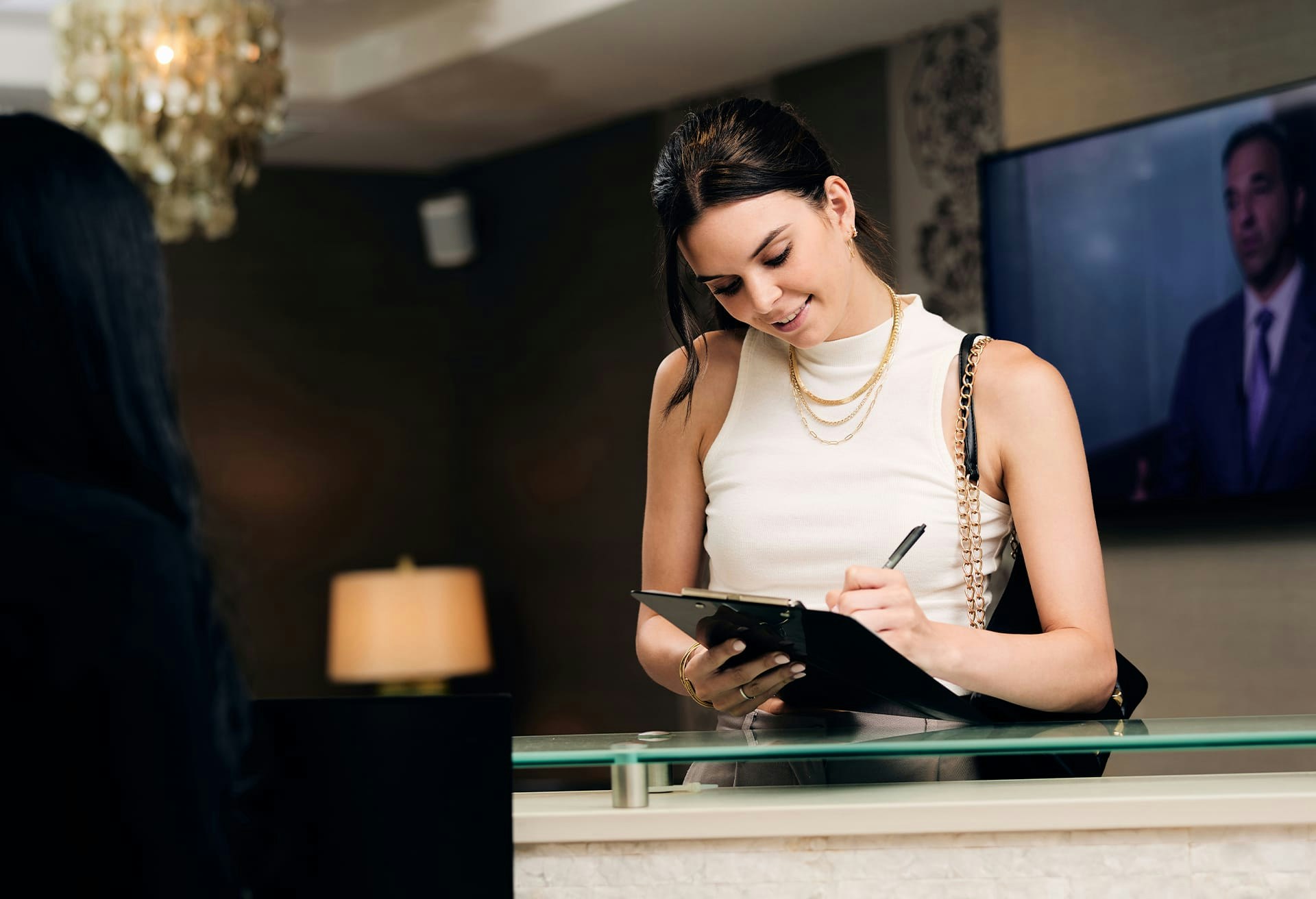 Woman Filling Out a Form