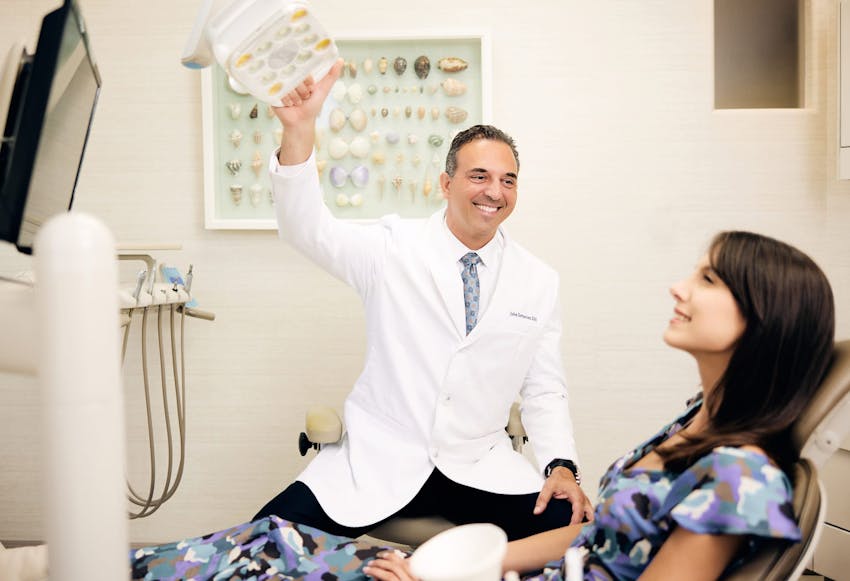 Dr. Vartanian Shining a Light on a Patient