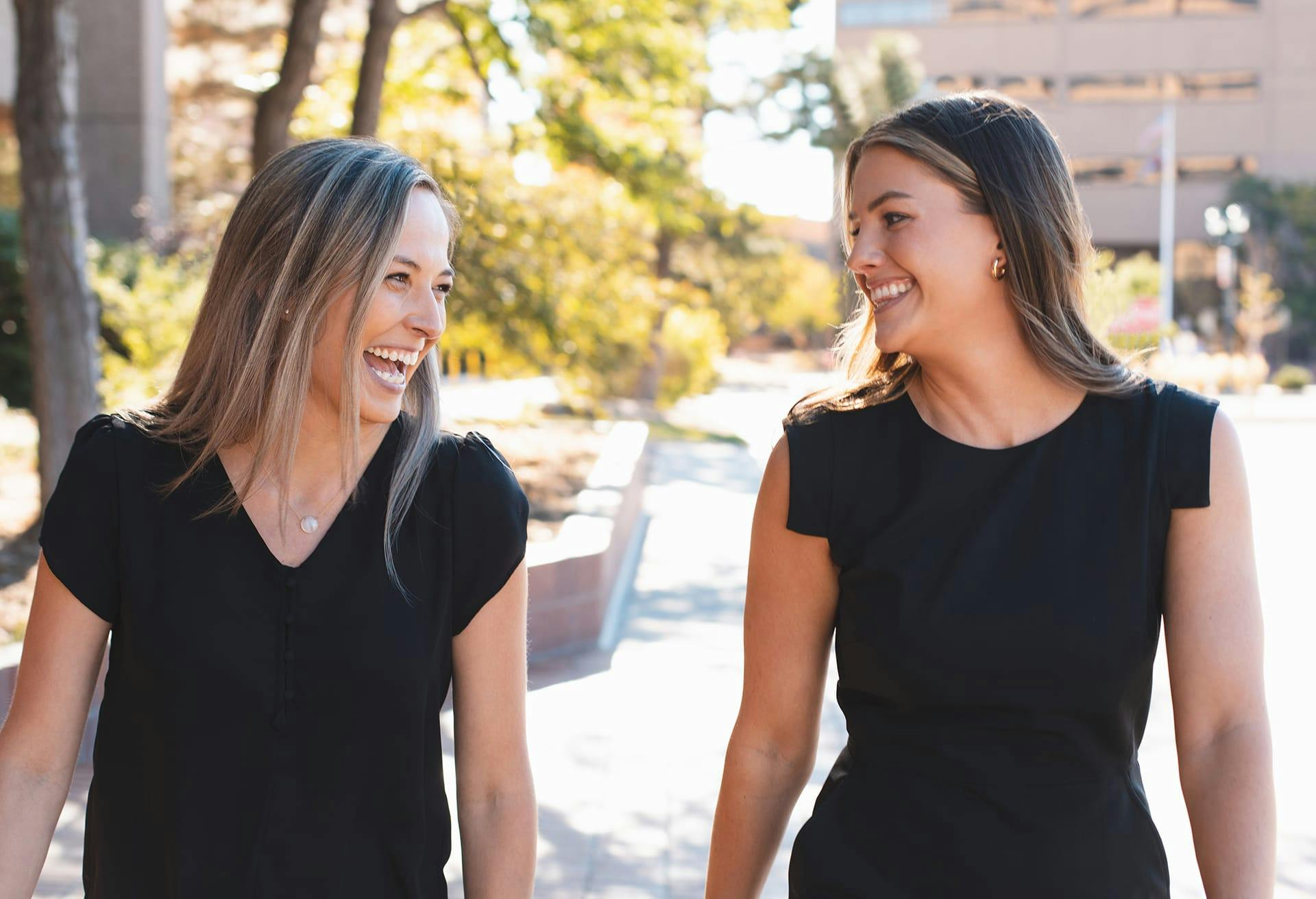 Two Women Laughing and Talking