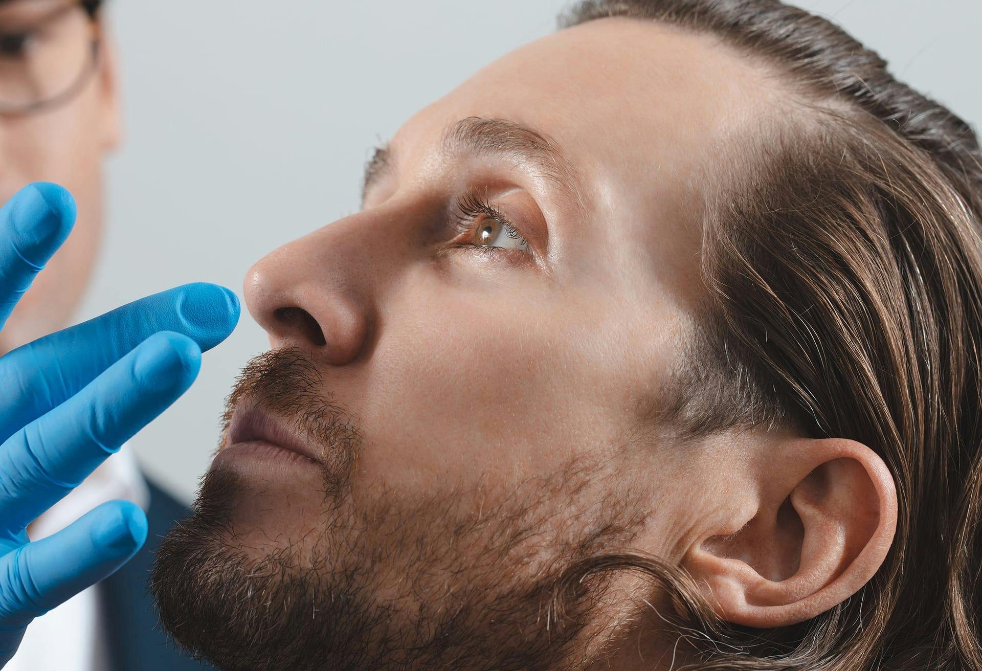 Man Receiving Facial Treatment