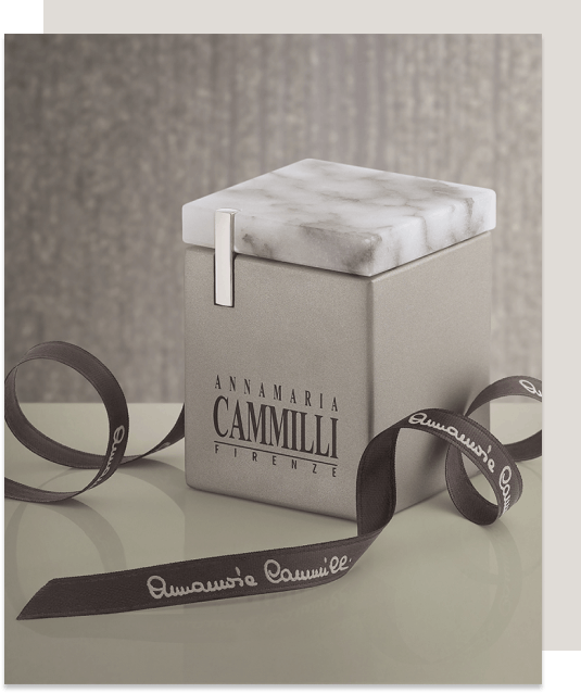 Black and white photo showing Annamaria Cammilli packaging sold by Biscioni Gioielli