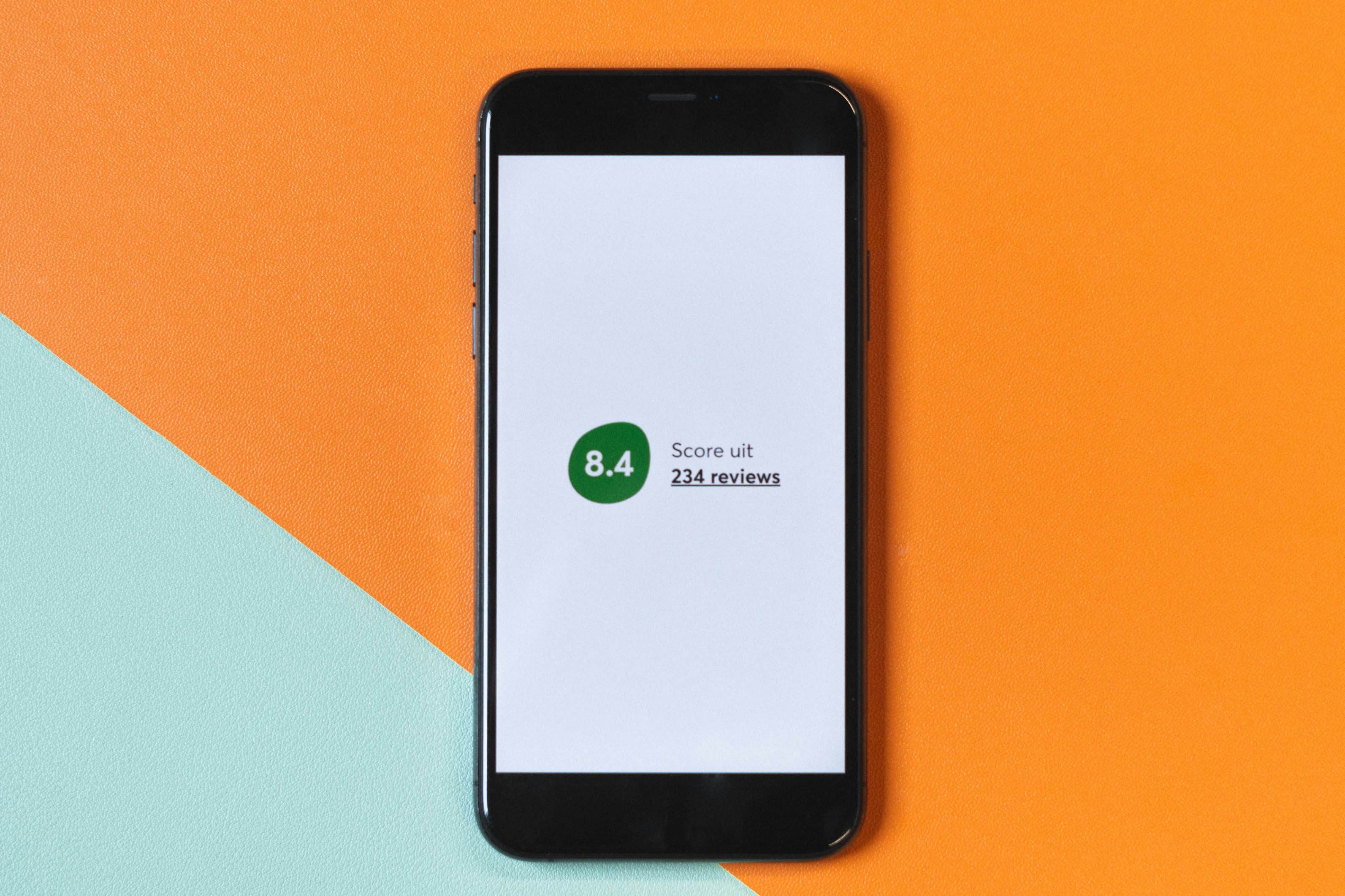 A phone with an automated video displaying a score for the accommodation