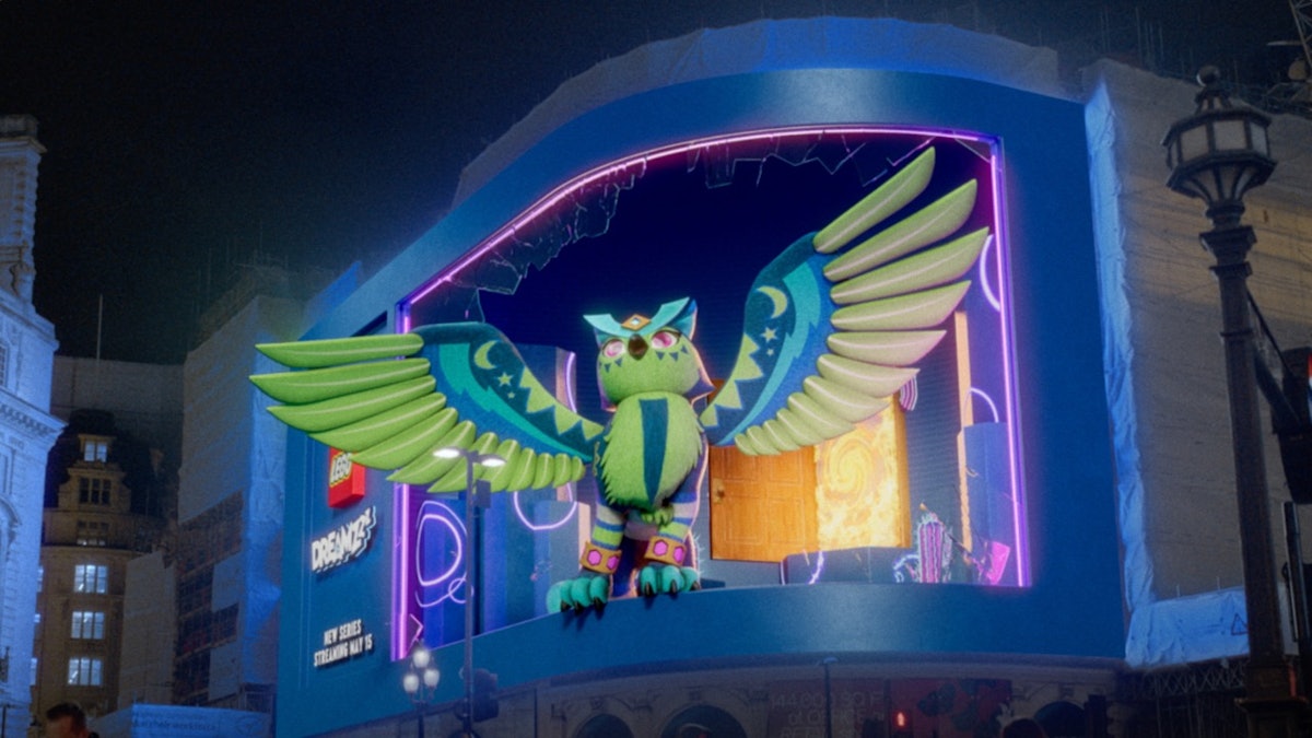 A curved London billboard where a winged LEGO DREAMZzz owl creature appears to fly out of a neon doorway.
