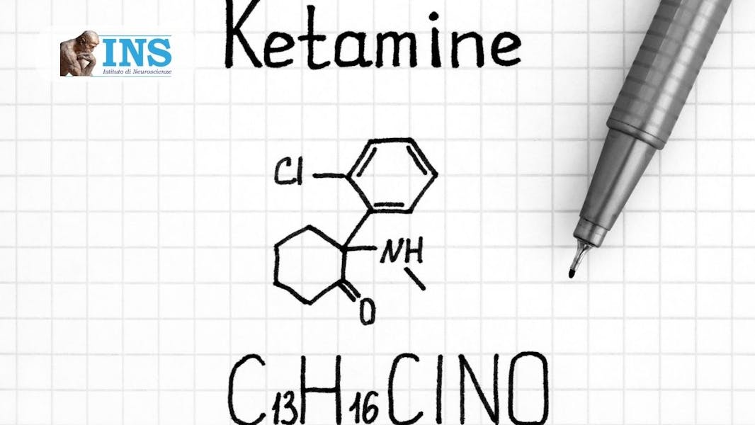 Ketamine chemical formula written on a square sheet of paper.