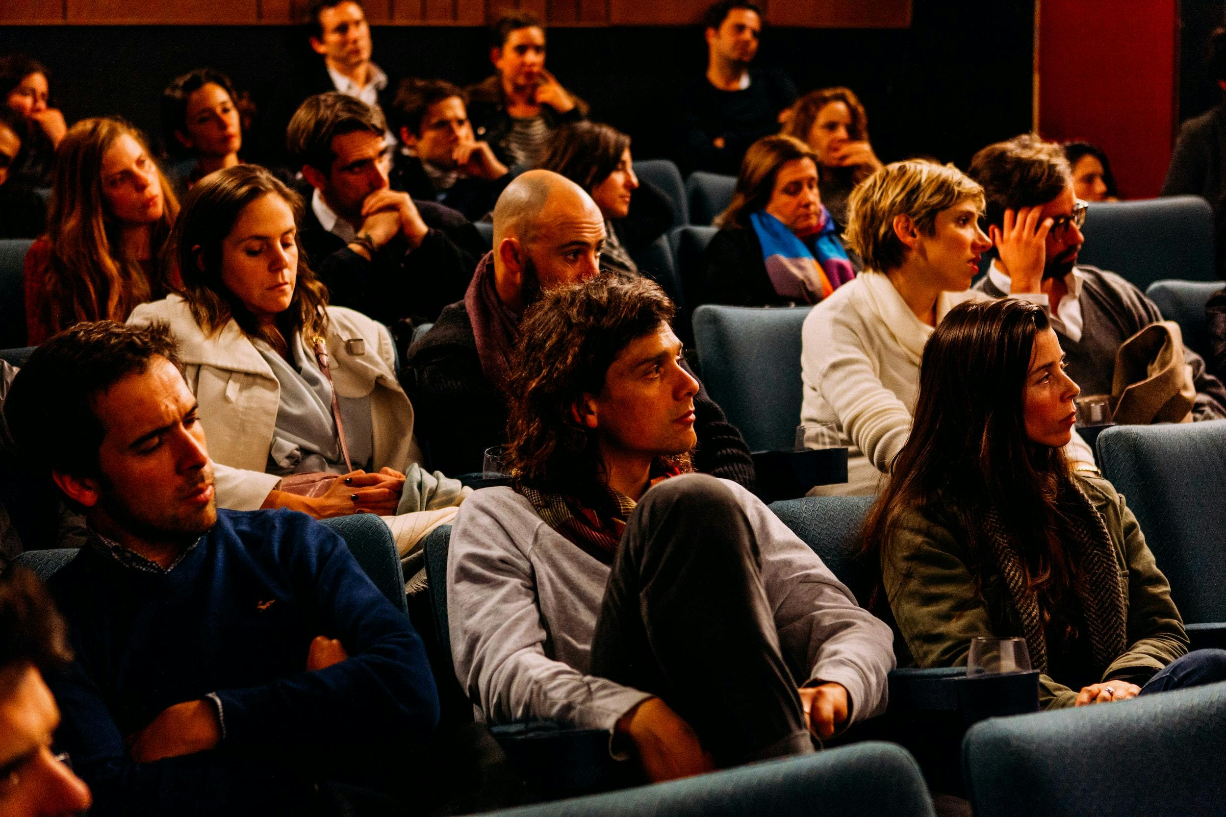 People sitting in chairs during a training course