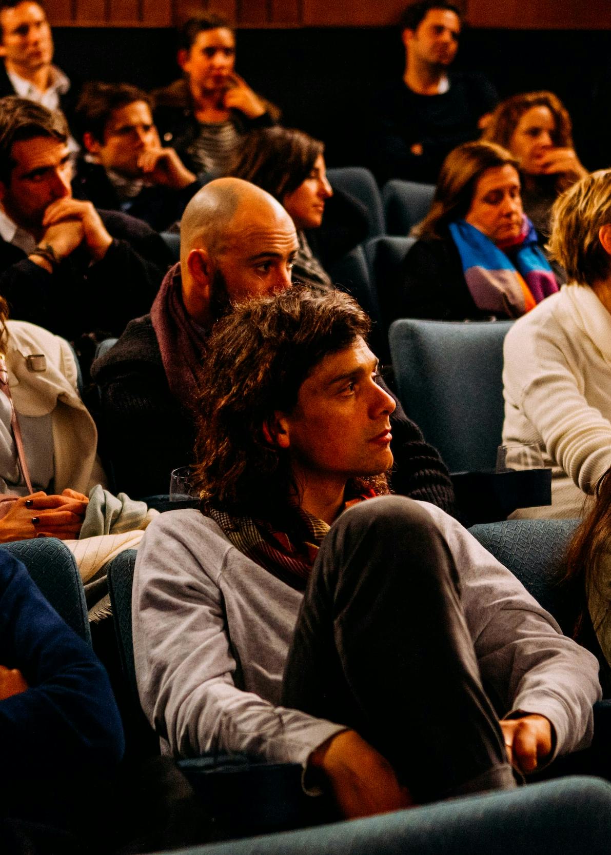 People sitting in chairs during a training course