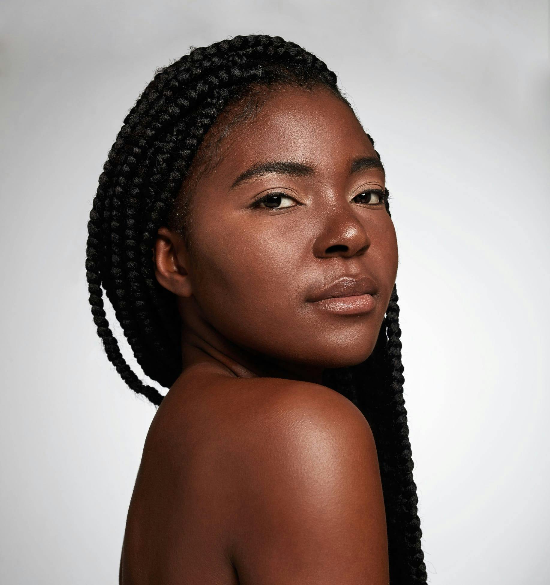 there is a woman with long black hair posing for a picture