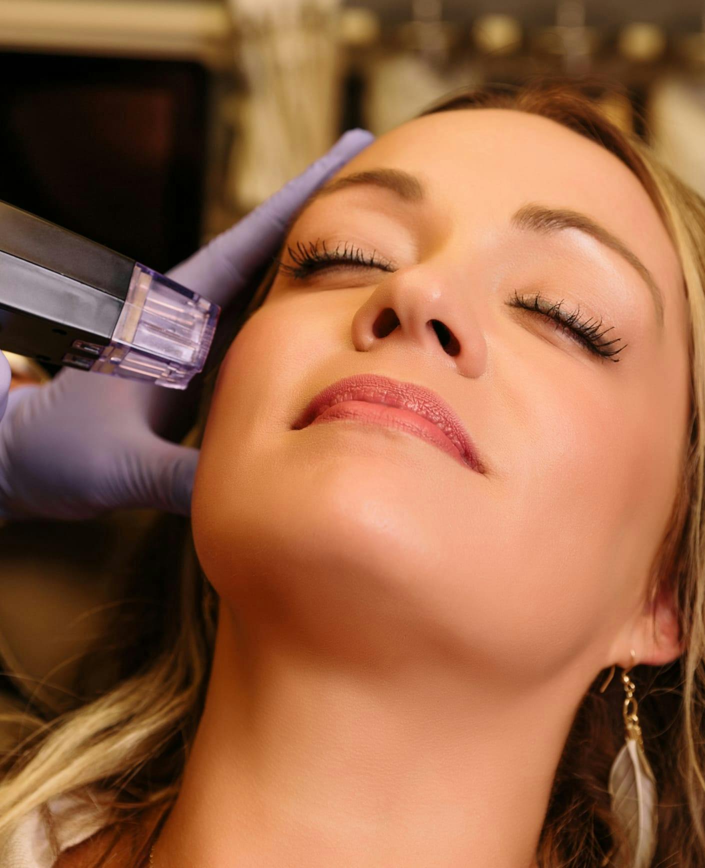 Woman receiving a procedure on the face