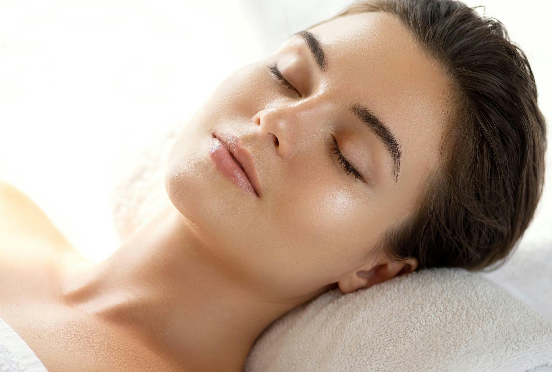 woman with her eyes closed