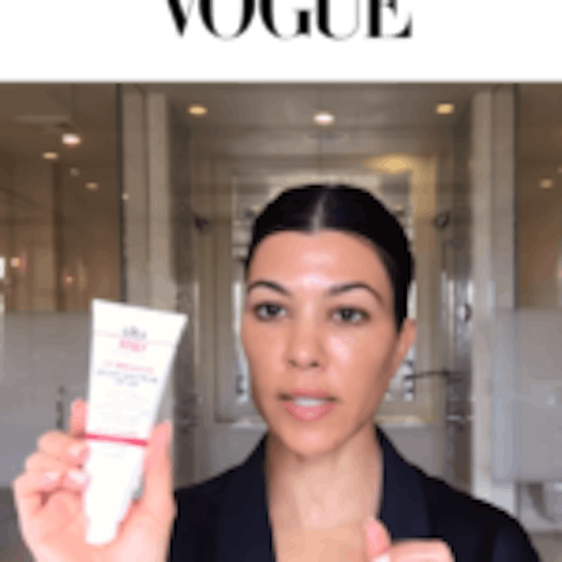 Kourtney Kardashian holding an EltaMD product