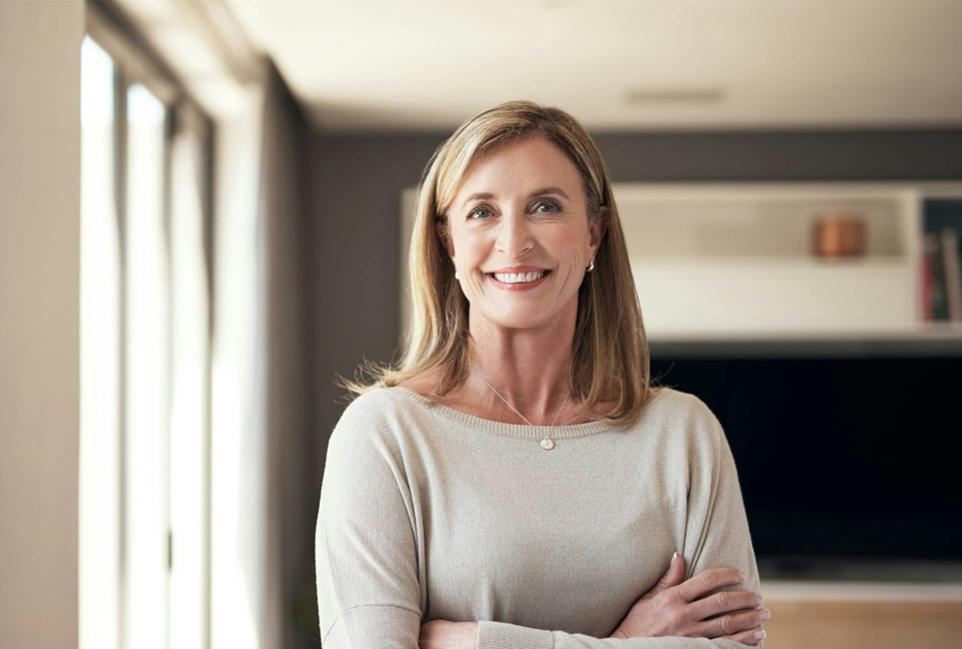 woman in a beige sweater