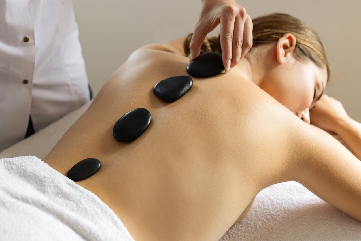 woman getting Hot Stone Massage