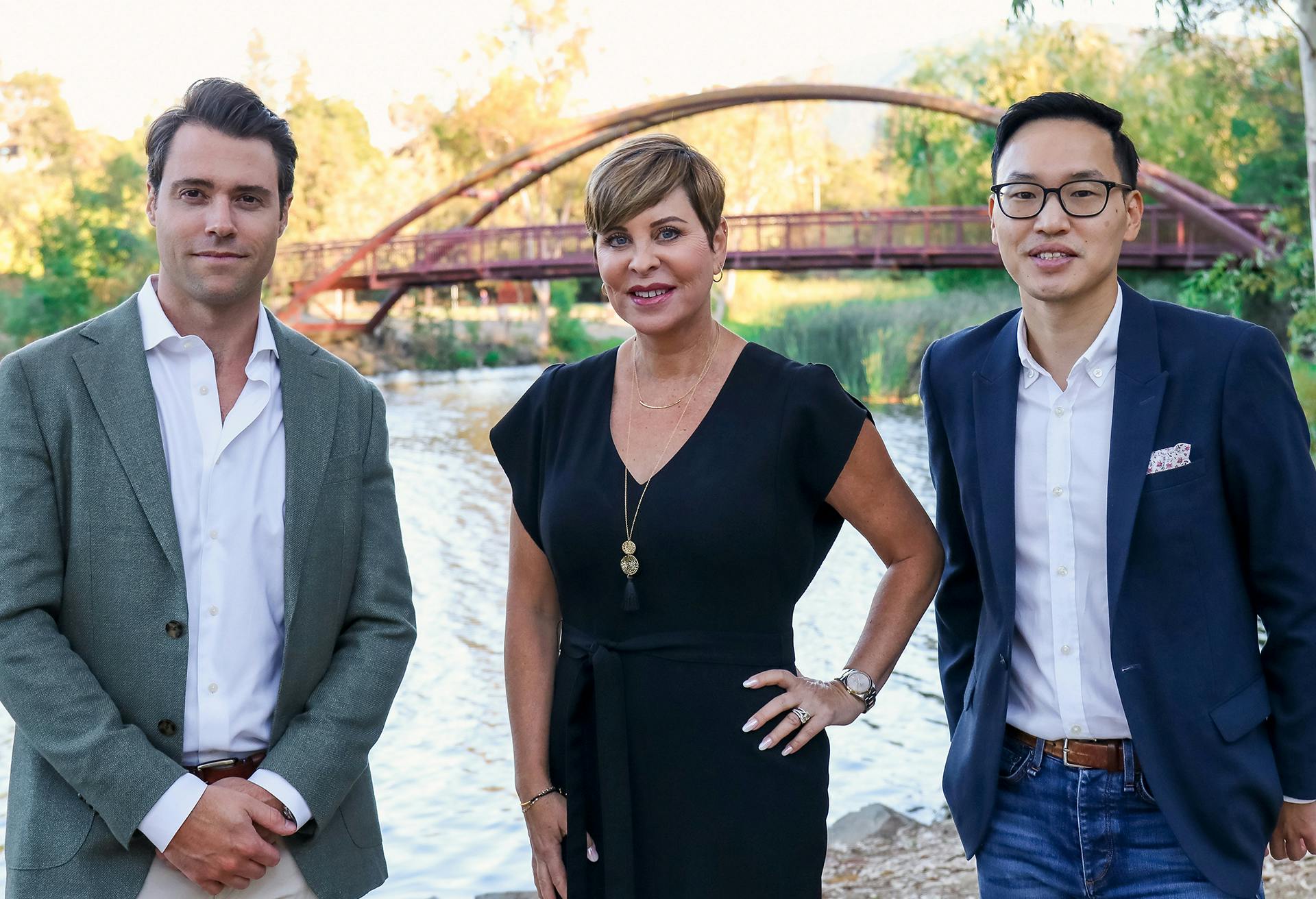 Dr. Gadaleta, Dr. Timothy Ortlip and Cindy Marino Posing in Front of a Bridge