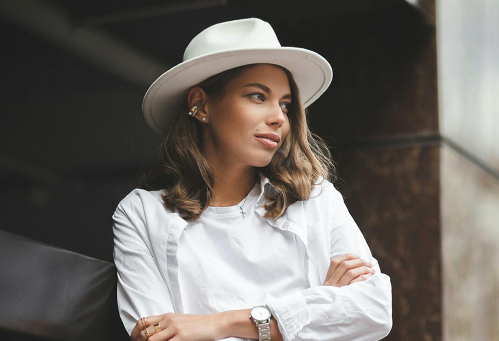 Woman in White Hat and Blouse