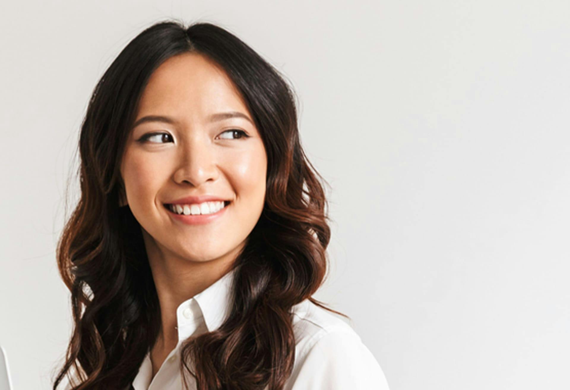 Woman with Long Dark Hair Smiling