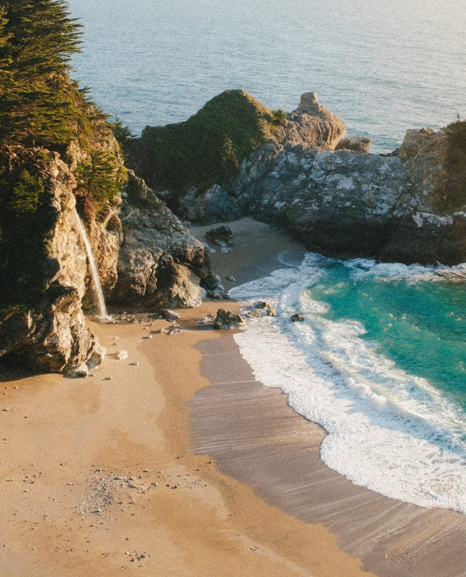 Image of beach with waterfall