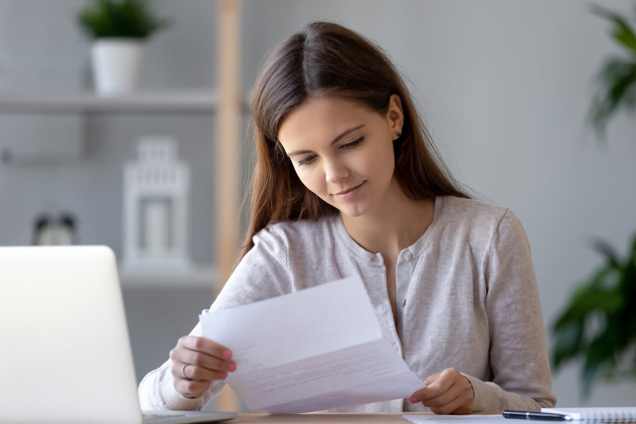 Woman Looking at a Document