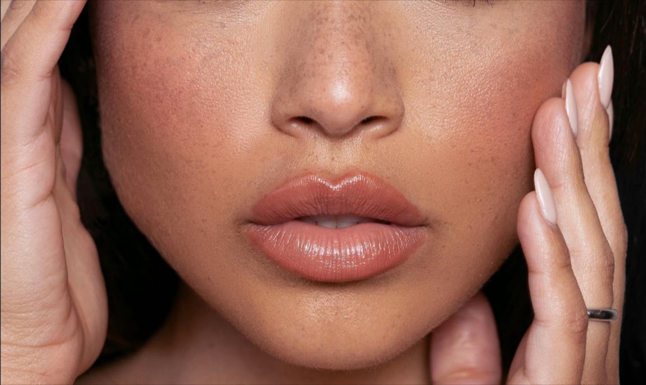 close up of womans lips