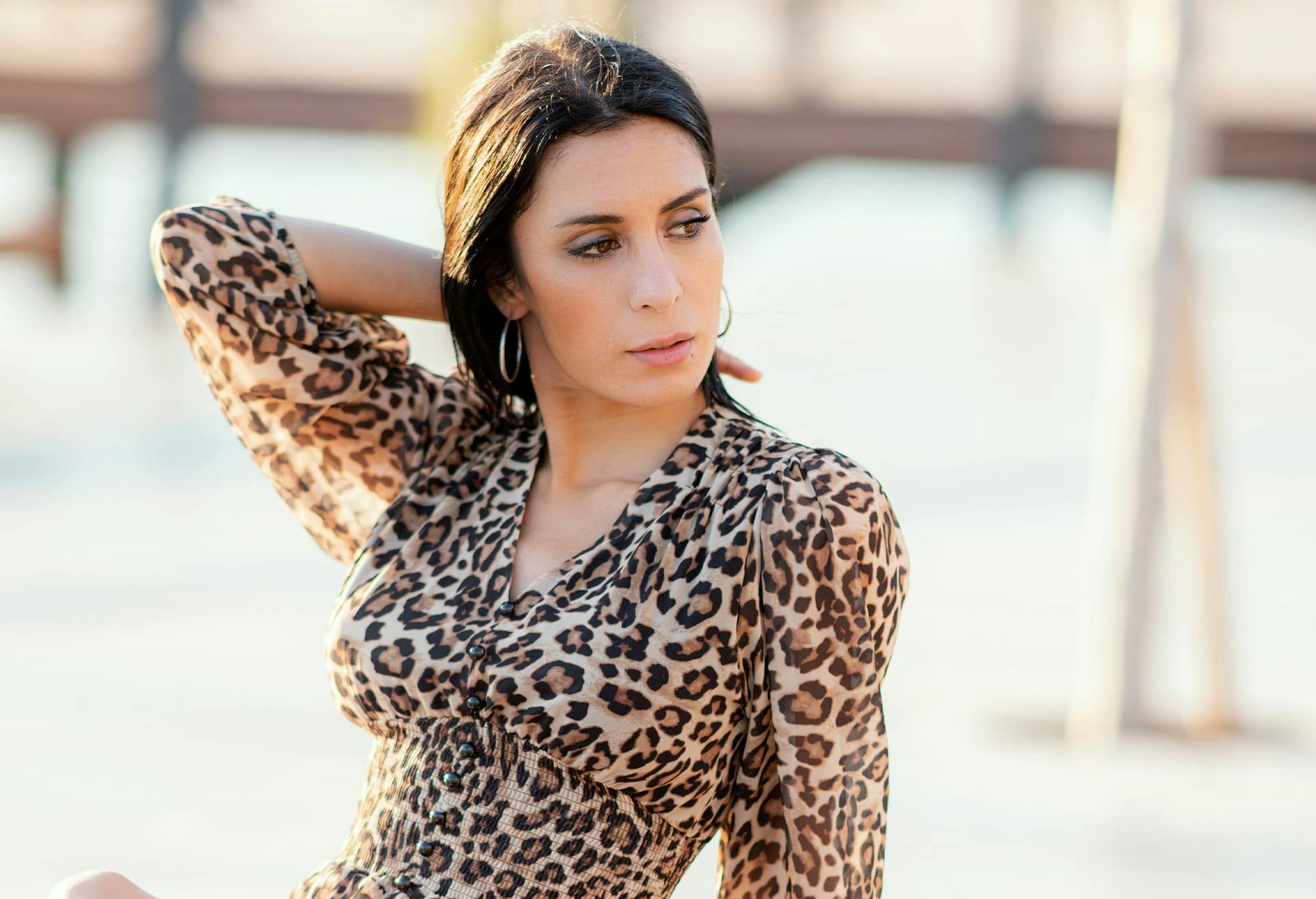 Woman Wearing Cheetah Blouse