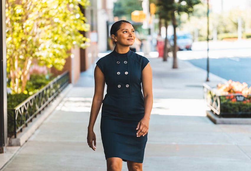 Woman Walking on a New York Sidewalk